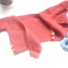 Wickeljacke Baby in Koralle und der Größe 62/68