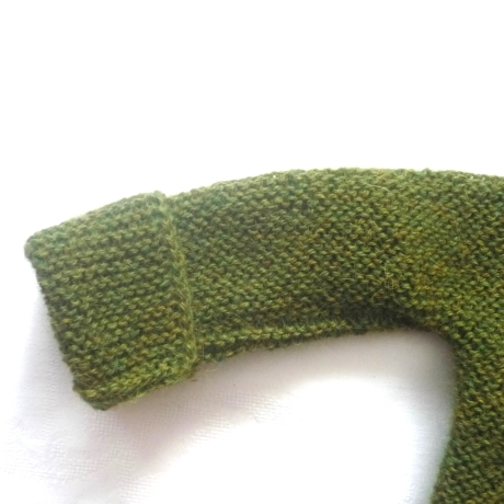 Wickeljacke Baby in Grasgrün und der Größe 62/68