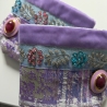 Aussergewöhnlicher Armschmuck, vergoldete Manschettenknöpfe