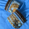 Einzigartiger Armschmuck aus einem Dior Seidentuch gefertigt