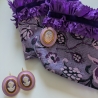 Edelfeiner Armschmuck mit vergoldeten Manschettenknöpfen 