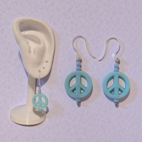 Ohrring mit PEACE Symbol
