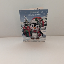 Weihnachtskarte mit einem süßen Pinguin