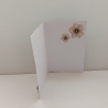 Weihnachtskarte mit rosafarbenen Blumen