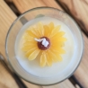 Dekorative Kerze im Glas - Sonnenblume 