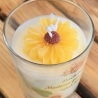 Dekorative Kerze im Glas - Sonnenblume 