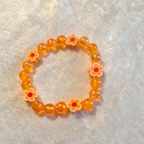 Kinder-Armband Schmuck elastisch Perlen gefädelt Orange mit Blume
