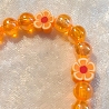 Kinder-Armband Schmuck elastisch Perlen gefädelt Orange mit Blume