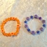 Kinder-Armband Schmuck elastisch Perlen gefädelt Orange mit Blume