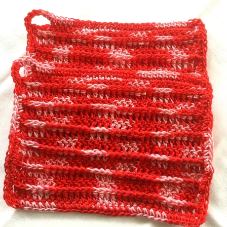 Topflappen in rot und rosa handgehäkelt von Hobbyhaus