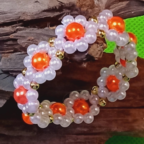 Armband Gänseblümchen Orange Perlenschmuck niedlich Armreifen 