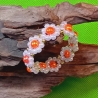 Armband Gänseblümchen Orange Perlenschmuck niedlich Armreifen 