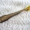 Vintage Zuckerzange silber- und goldenes Metall 70er Jahre