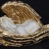 Schöne Figur, schlafender Engel mit goldenen Flügeln. 22 cm.