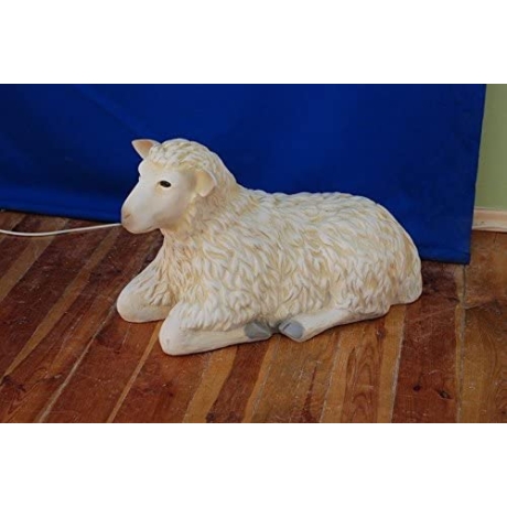 Figur einer liegenden Schafes. 40 cm.