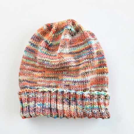 Handgestrickte Babymütze 3-9 Monate mit variablem Umschlag