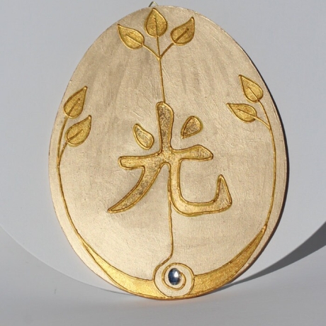 Feng Shui Wand Deko Goldenes Ei mit Kalligraphie für Licht