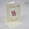 Gestickte Geburtskarte creme mit rosa Kinderwagen