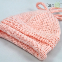 Gestrickte Babymütze in rosa