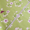 beschichtete Baumwolle Kirschblüte grün Vögel