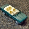 Herpa BMW 3er Cabrio (E30) Modellauto in grün/türkis – Maßstab 1:87 – Sammlerstück mit Mängeln für BMW-Fans und Modellauto-Liebhaber H0 1/87
