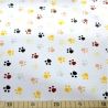 Baumwoll Stoff Struppi Pfotenabdrücke braun, schwarz, gelb, beige und grau auf weißem Hintergrund