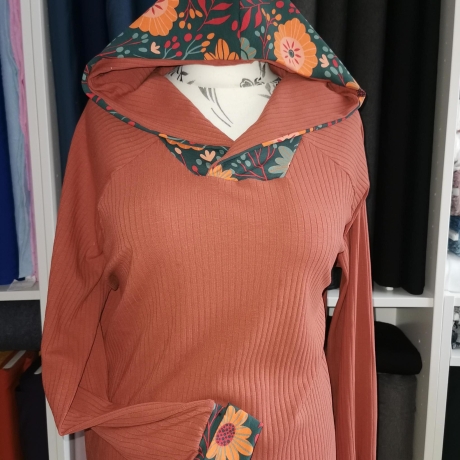 Baumwolljersey Stoff Rabea orangene Blumen petrolfarbener Hintergrund