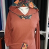 Baumwolljersey Stoff Rabea orangene Blumen petrolfarbener Hintergrund