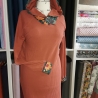 Baumwolljersey Stoff Rabea orangene Blumen petrolfarbener Hintergrund