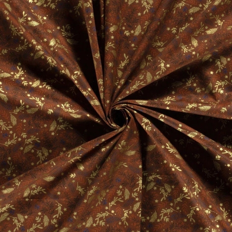 Reststück: Baumwollstoff Weihnachten Kelly ziegelfarbener Untergrund mit Blätter und kleinen Sternchen in gold bedruckt; ca. 0,5m