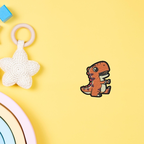 Orange Dinosaurier Patch, zum aufbügeln oder aufnähen, 7.5 cm, gestickte Applikation