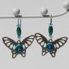 Schmetterling Ohrringe mit Glücksbringer Auge in Türkis Blau