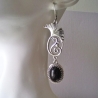 Ohrschmuck aus filigranem Verbinder und Glas Cabochon