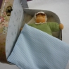 Kofferpuppe, Babypüppchen im Kofferbett
