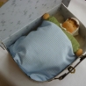 Kofferpuppe, Babypüppchen im Kofferbett