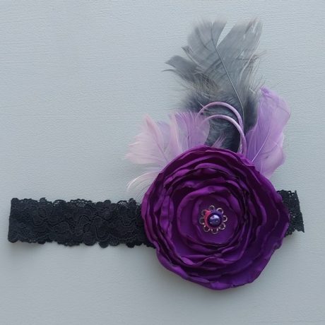Stirnband mit lila Blume