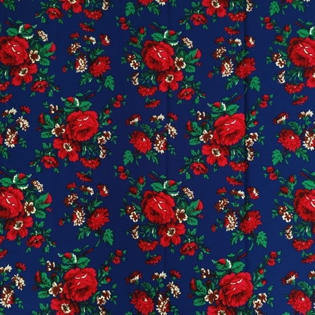Stoff mit Blumenmuster auf blauem Hintergrund